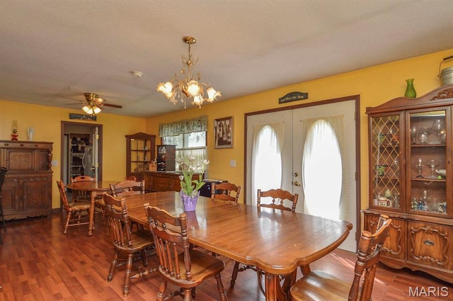 dining area with plenty of natural light, french doors, wood finished floors, and ceiling fan