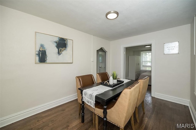 4117 Ravenwood Ave, Saint Louis, MO 63121 - dining room with baseboards and dark wood-style floors