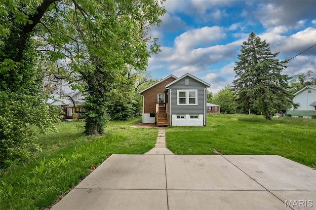 4117 Ravenwood Ave, Saint Louis, MO 63121 - view of front of home with a front yard