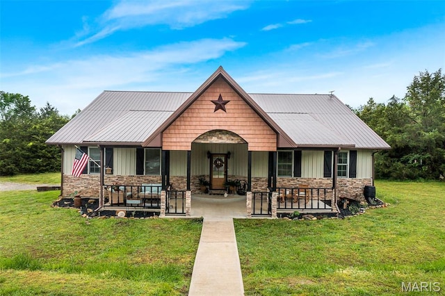 1350 Madison 500, Fredericktown, MO 63645 - view of front of property with a front yard, a porch, and stone siding