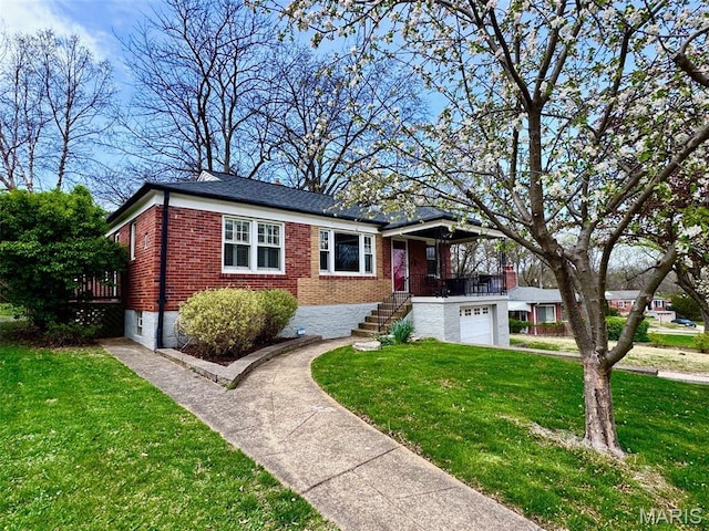 view of front facade featuring brick siding, a front lawn, stairway, and an attached garage
