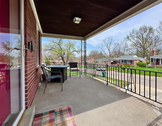 view of patio / terrace with a residential view
