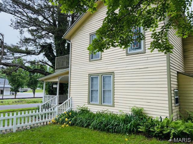 305 Frisco St, Steelville, MO 65565 - view of side of property featuring a balcony