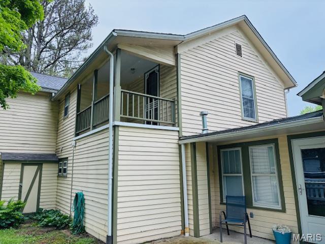 305 Frisco St, Steelville, MO 65565 - view of property exterior featuring a balcony