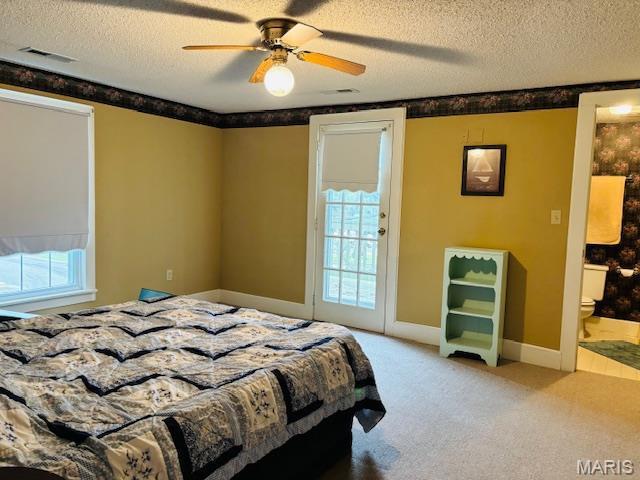 305 Frisco St, Steelville, MO 65565 - bedroom with a textured ceiling, light carpet, a ceiling fan, and baseboards