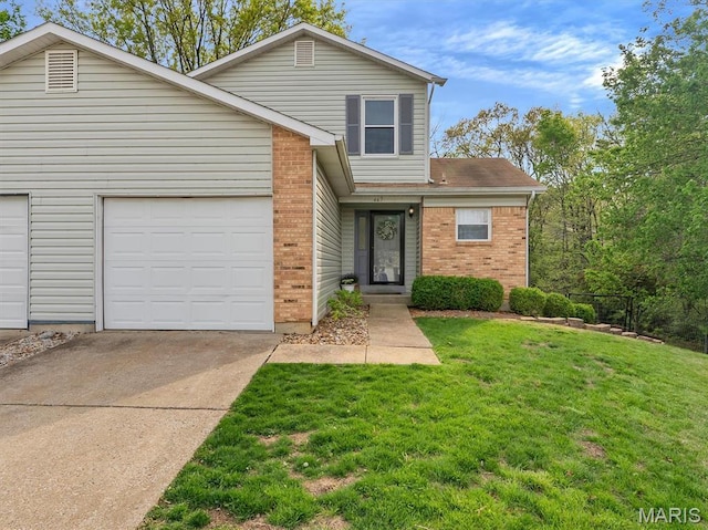 447 Omar Ct, Saint Peters, MO 63376 - traditional-style home featuring driveway, brick siding, a front yard, and a garage