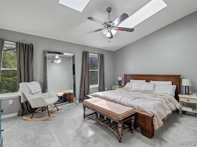 447 Omar Ct, Saint Peters, MO 63376 - bedroom featuring a skylight, carpet flooring, a ceiling fan, and baseboards