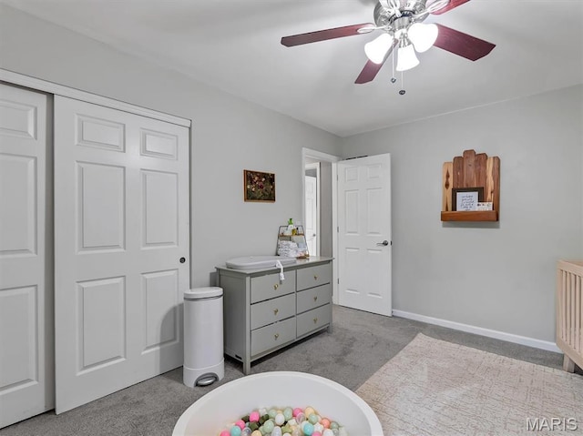 447 Omar Ct, Saint Peters, MO 63376 - bedroom featuring carpet, a ceiling fan, a closet, and baseboards