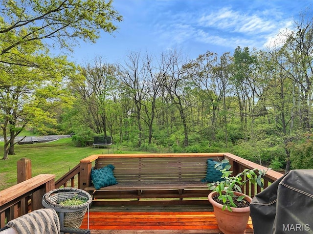 447 Omar Ct, Saint Peters, MO 63376 - wooden deck featuring a trampoline and a lawn