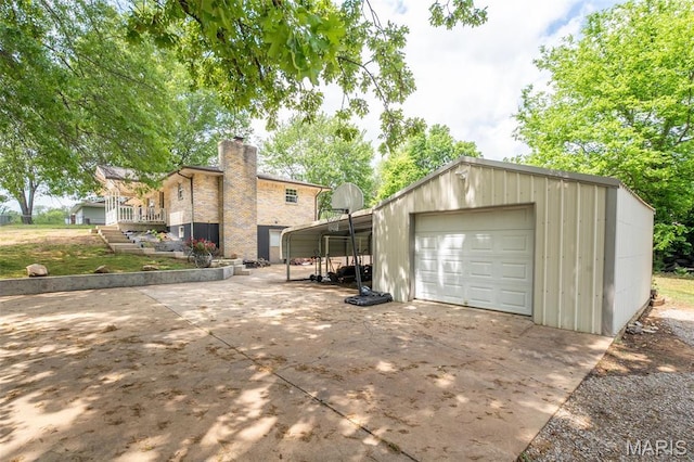 2003 Kysar Rd, Poplar Bluff, MO 63901 - garage featuring concrete driveway and a garage