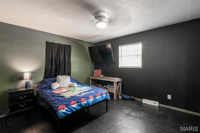 2003 Kysar Rd, Poplar Bluff, MO 63901 - bedroom with baseboards, a textured ceiling, and a ceiling fan