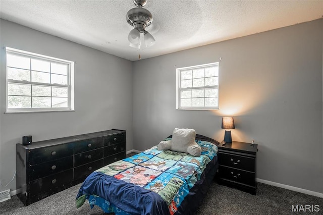2003 Kysar Rd, Poplar Bluff, MO 63901 - bedroom with carpet, a textured ceiling, baseboards, and ceiling fan