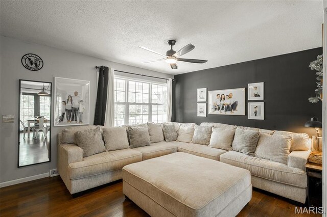 2003 Kysar Rd, Poplar Bluff, MO 63901 - living room with a ceiling fan, dark wood finished floors, healthy amount of natural light, a textured ceiling, and baseboards