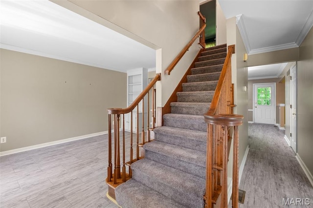 1439 Briarcreek Dr, Saint Louis, MO 63122 - stairway featuring ornamental molding and wood finished floors