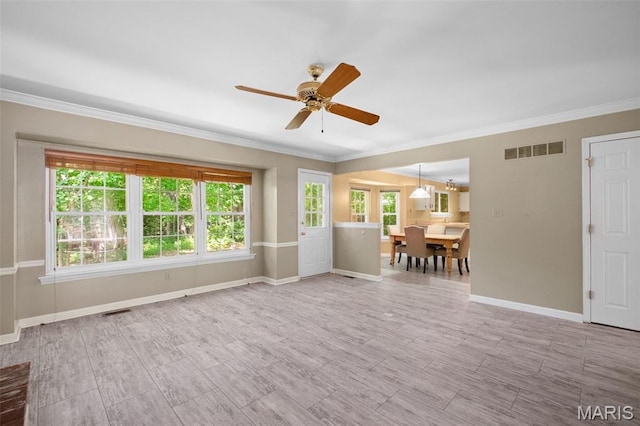 1439 Briarcreek Dr, Saint Louis, MO 63122 - living room featuring ornamental molding, plenty of natural light, ceiling fan, and wood finished floors