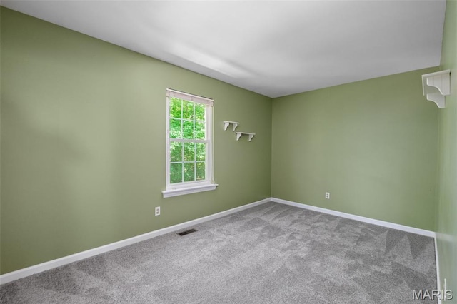 1439 Briarcreek Dr, Saint Louis, MO 63122 - unfurnished room featuring baseboards and carpet