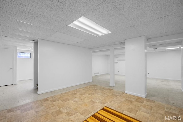 1439 Briarcreek Dr, Saint Louis, MO 63122 - basement with tile patterned floors and a paneled ceiling
