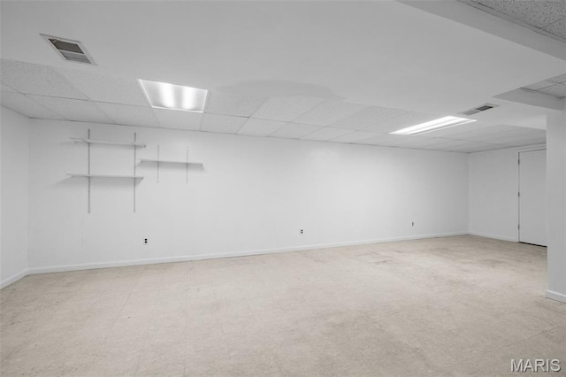 1439 Briarcreek Dr, Saint Louis, MO 63122 - below grade area featuring a paneled ceiling and baseboards