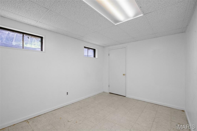 1439 Briarcreek Dr, Saint Louis, MO 63122 - basement with a paneled ceiling and baseboards
