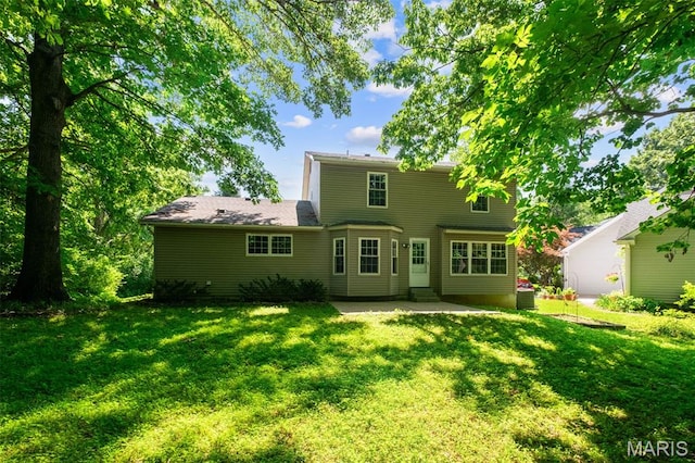 1439 Briarcreek Dr, Saint Louis, MO 63122 - back of house featuring a lawn and a patio