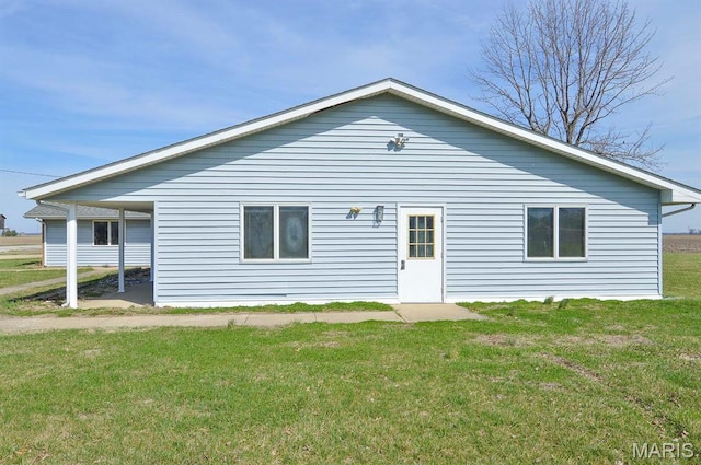 620 N Main St, Hoyleton, IL 62803 - back of house featuring a lawn