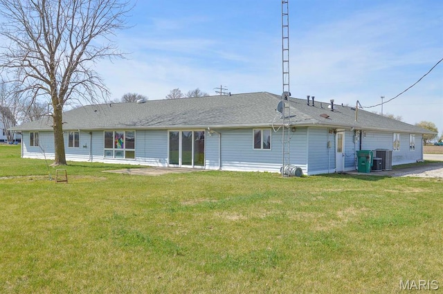 620 N Main St, Hoyleton, IL 62803 - back of property with central air condition unit and a yard