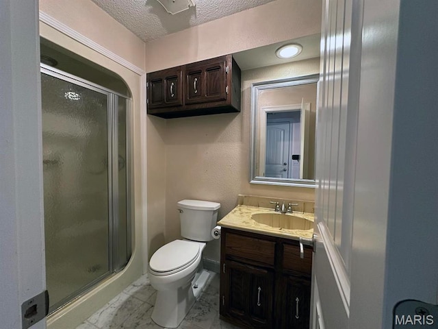 15012 Bay Hills Dr, Dexter, MO 63841 - bathroom with a stall shower, vanity, a textured ceiling, toilet, and baseboards