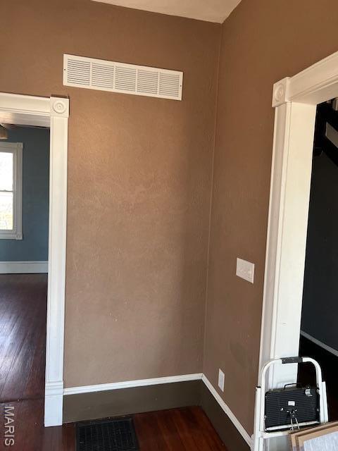 421 S 3rd St, Breese, IL 62230 - spare room featuring dark wood-style flooring and baseboards
