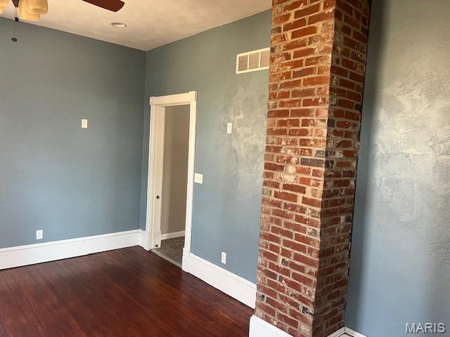 421 S 3rd St, Breese, IL 62230 - unfurnished room featuring dark wood-style flooring, ceiling fan, and baseboards