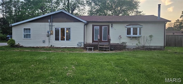 519 N Maple St, Duquoin, IL 62832 - back of house featuring a lawn