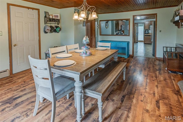 519 N Maple St, Duquoin, IL 62832 - dining room with wooden ceiling, ornamental molding, a chandelier, and wood finished floors