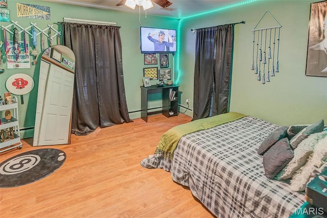519 N Maple St, Duquoin, IL 62832 - bedroom with wood finished floors and ceiling fan