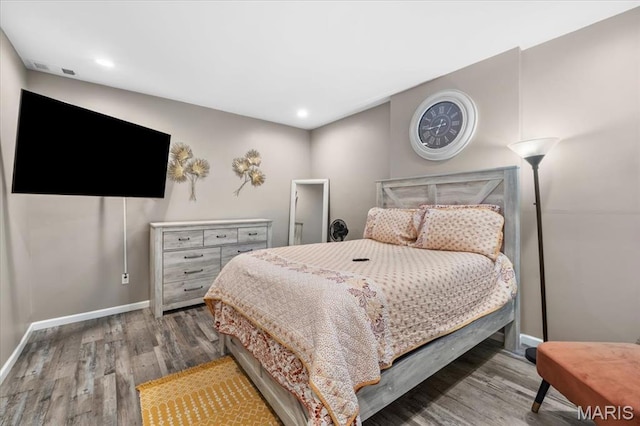 1428 Mallinckrodt, Saint Louis, MO 63107 - bedroom with wood finished floors, baseboards, and recessed lighting