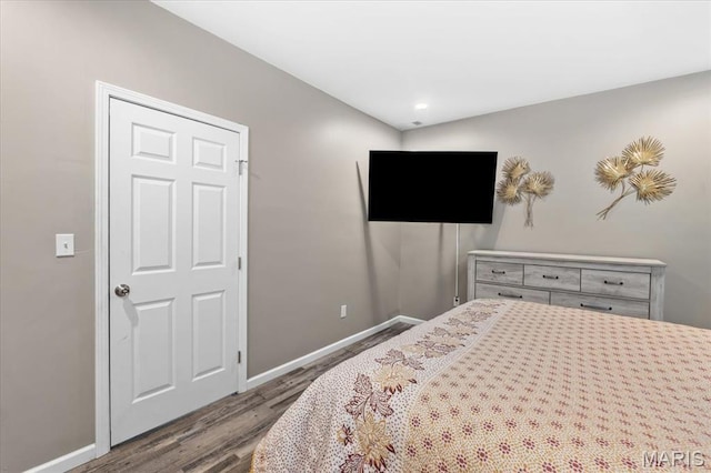 1428 Mallinckrodt, Saint Louis, MO 63107 - bedroom with wood finished floors and baseboards