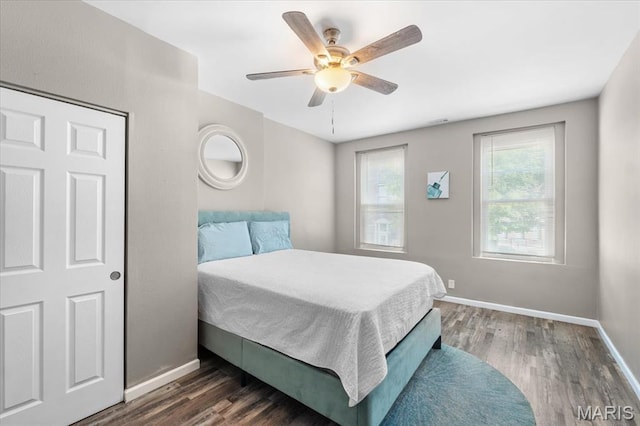 1428 Mallinckrodt, Saint Louis, MO 63107 - bedroom featuring baseboards, wood finished floors, and ceiling fan