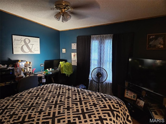 211 N Lucas St, Pilot Knob, MO 63663 - bedroom featuring ornamental molding, a textured ceiling, vaulted ceiling, and ceiling fan