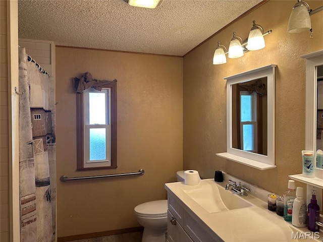 211 N Lucas St, Pilot Knob, MO 63663 - bathroom featuring a textured ceiling, vanity, toilet, a textured wall, and a shower with shower curtain