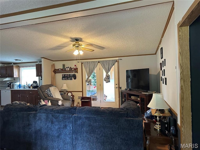 211 N Lucas St, Pilot Knob, MO 63663 - living room featuring a textured ceiling, ceiling fan, and crown molding