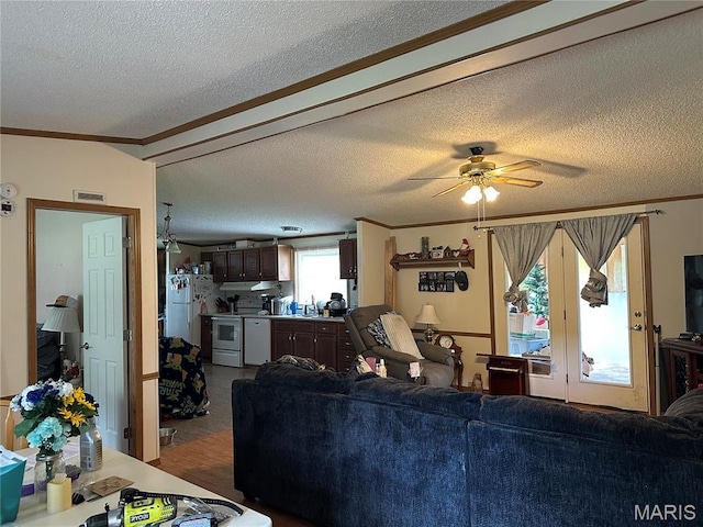 211 N Lucas St, Pilot Knob, MO 63663 - living area featuring crown molding, a textured ceiling, and a ceiling fan