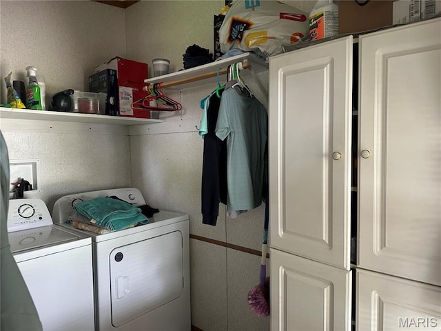 211 N Lucas St, Pilot Knob, MO 63663 - laundry room featuring cabinet space and separate washer and dryer