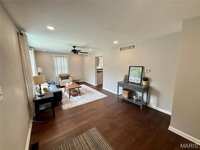 409 Oak St, East Alton, IL 62024 - living room with dark wood finished floors, ceiling fan, baseboards, and recessed lighting