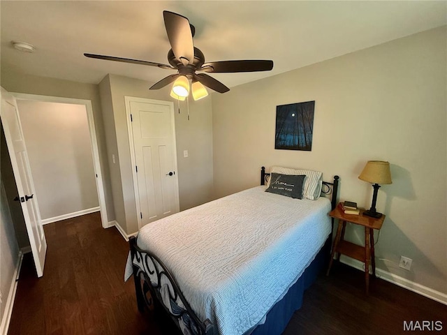 409 Oak St, East Alton, IL 62024 - bedroom featuring baseboards, wood finished floors, and ceiling fan