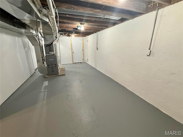 409 Oak St, East Alton, IL 62024 - unfinished basement featuring heating unit