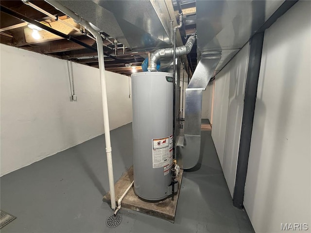409 Oak St, East Alton, IL 62024 - utility room featuring water heater