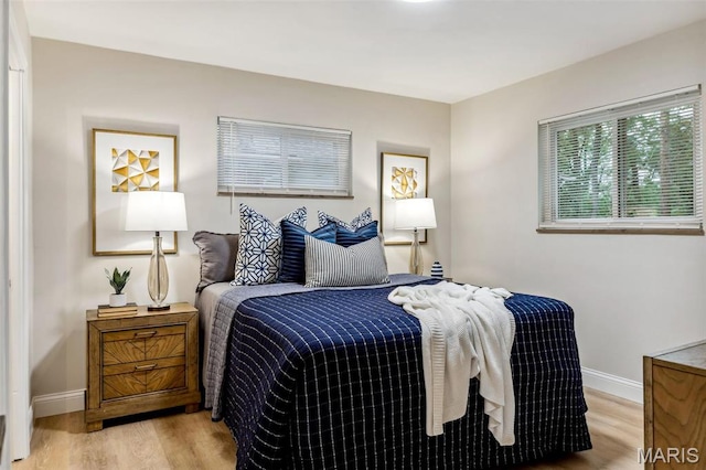 1548 Park Dr Way, Saint Louis, MO 63130 - bedroom featuring wood finished floors and baseboards
