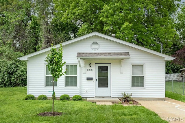 1331 Belrue Ave, Saint Louis, MO 63133 - view of front of property with roof with shingles and view of scattered trees