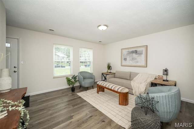 1331 Belrue Ave, Saint Louis, MO 63133 - living area with wood finished floors and baseboards