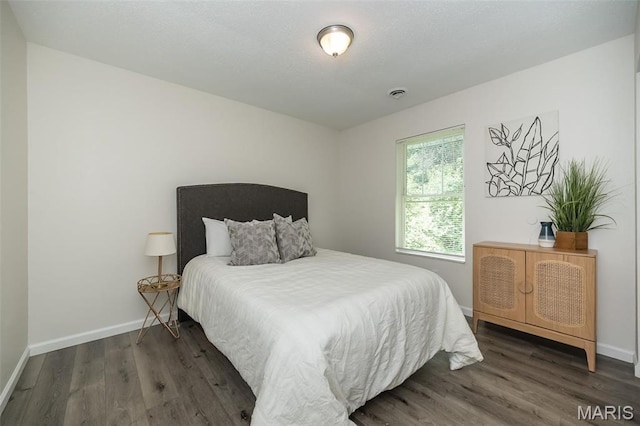 1331 Belrue Ave, Saint Louis, MO 63133 - bedroom with wood finished floors and baseboards