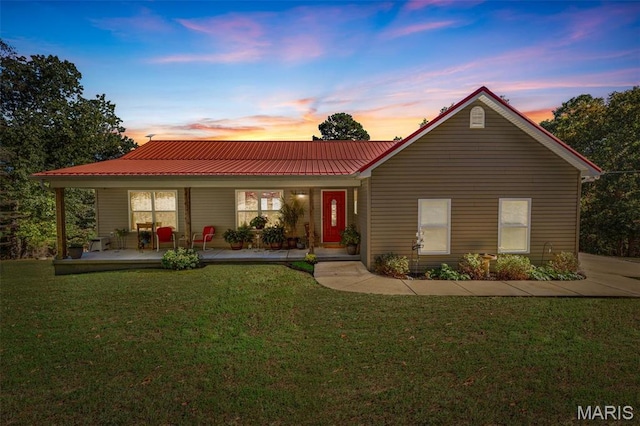 8007 Engleford Rd, Dittmer, MO 63023 - view of front facade with a porch, metal roof, and a front yard