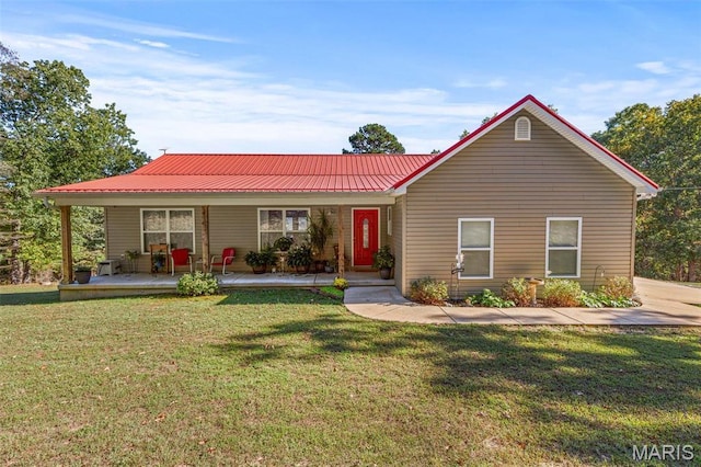 8007 Engleford Rd, Dittmer, MO 63023 - ranch-style home with metal roof, a front yard, and a porch